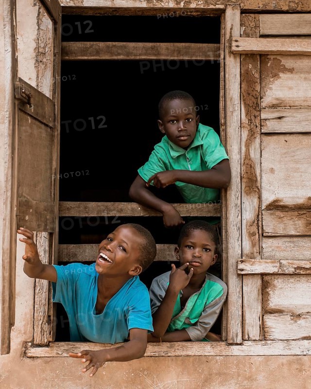 Medium shot african kids window