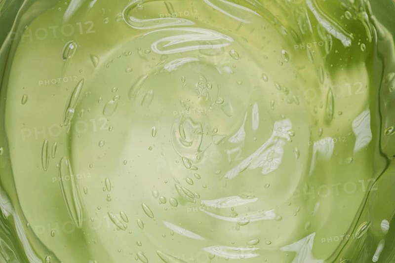 Flat lay green liquid wallpaper