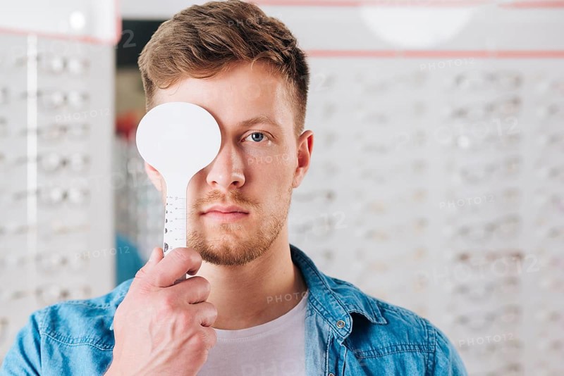 Portrait man doing test eye vision