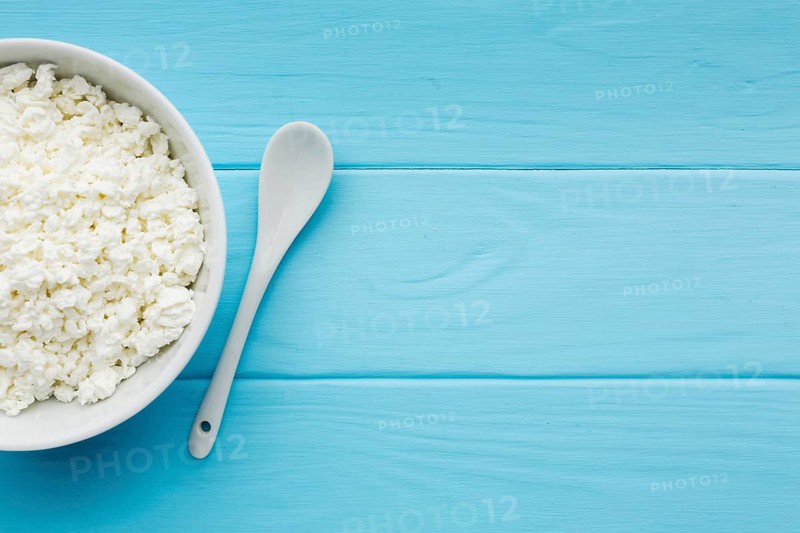 Top view organic cottage cheese with copy space