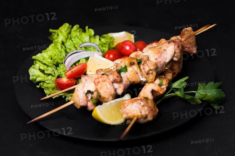 Cooked meat veggies kebab high view