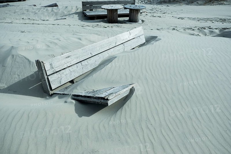 Shipped wooden furniture on the beach of West on the North Sea island of Terschelling