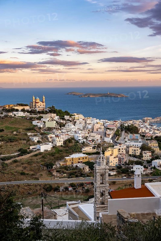 View of the town of Ermoupoli with Anastasi Church or Church of the Resurrection at sunset