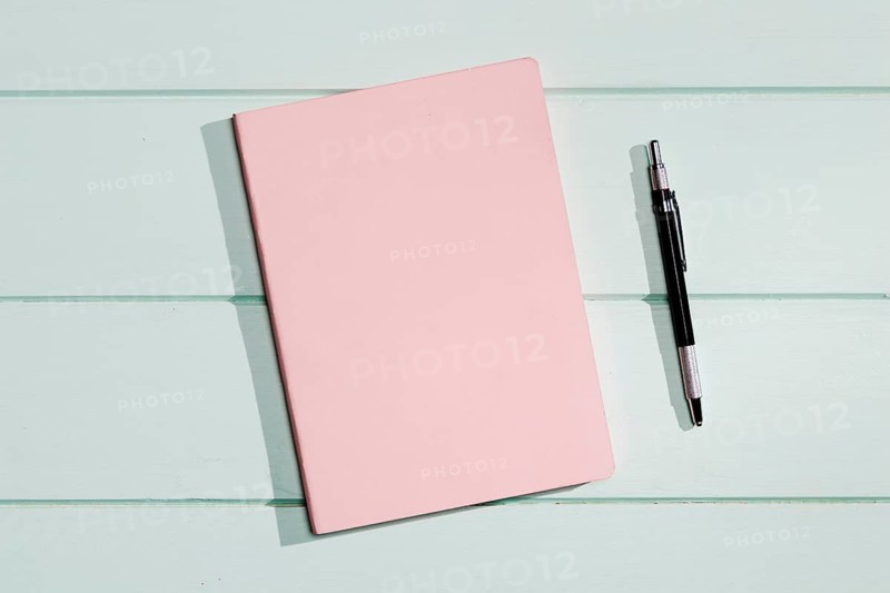 Pink cover notepad with pen
