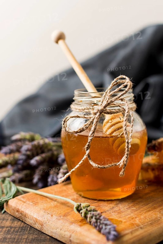Honey jar with spoon lavender