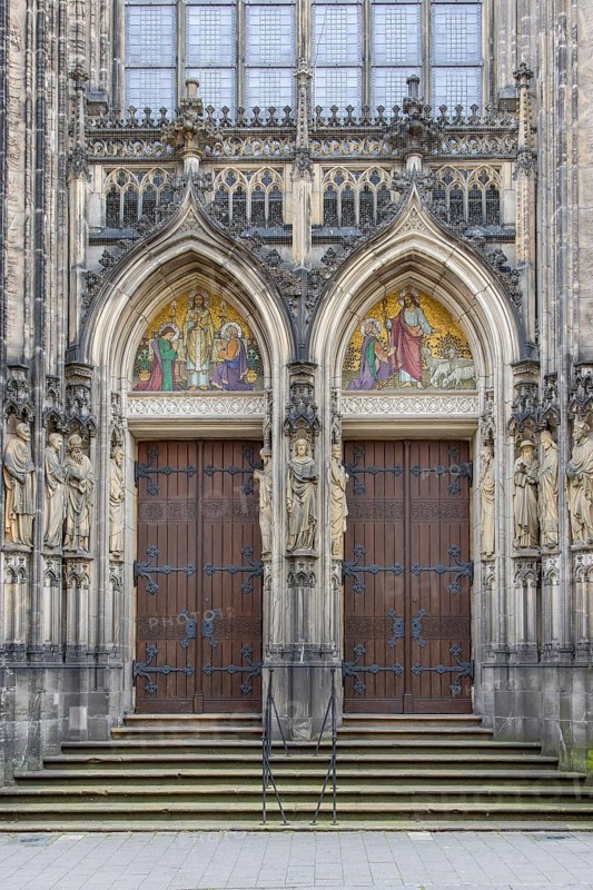Entrance portal with mosaic at the St Lamberti Catholic Church on Lambertikirchplatz