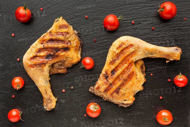 Top view baked chicken tomatoes