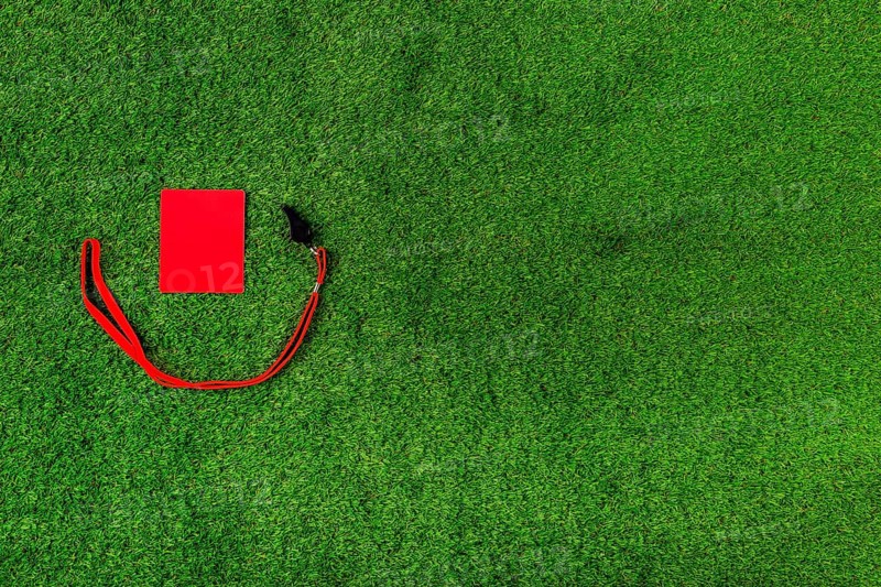 Football composition with copyspace red card