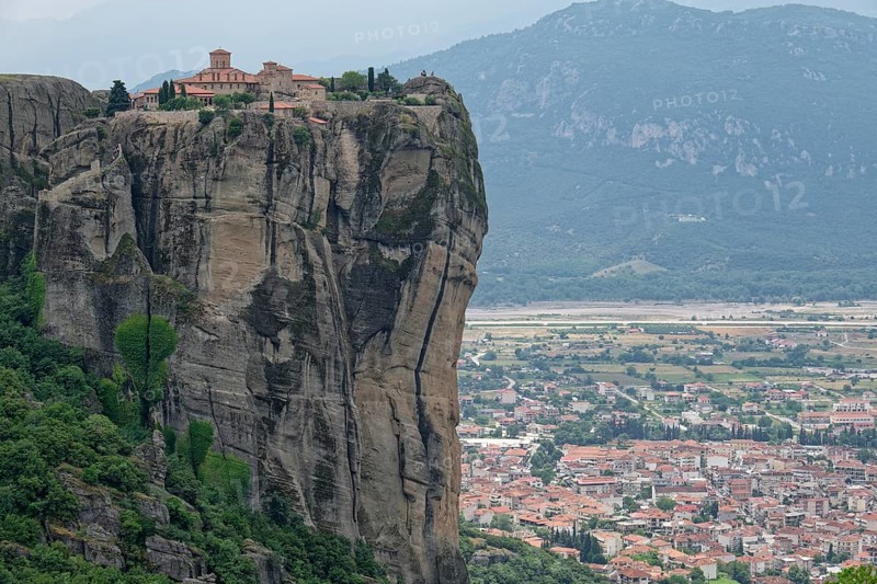 The Meteora Monastery Agia Triada Holy Trinity. The Greek Orthodox Meteora monasteries are built on sandstone cliffs above the Pinios valley. They are a UNESCO World Heritage Site. Kalambaka
