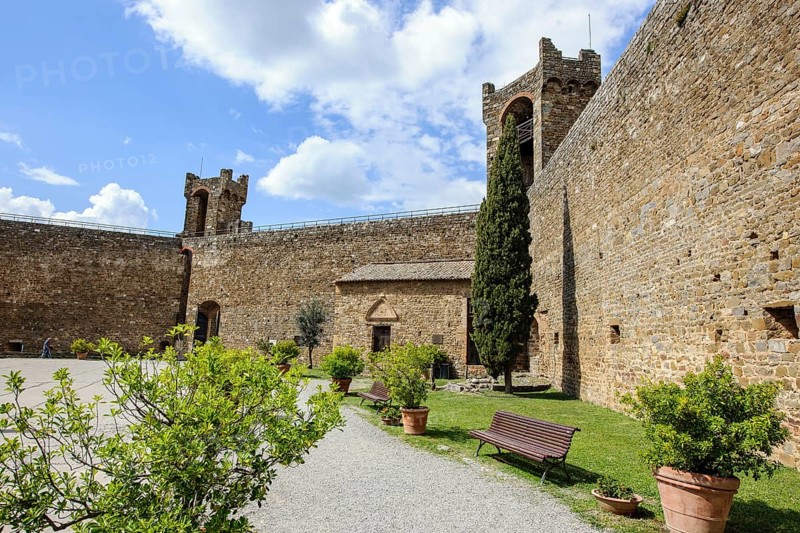 View from courtyard on fortification walls towers watchtowers of castle of Fortezza di Montalcino