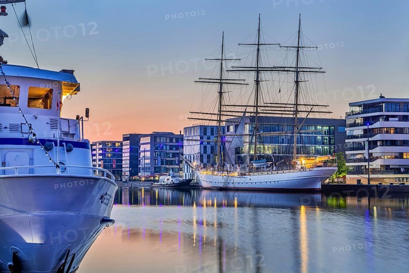 Excursion ship and sail training vessel Germany in the New Harbour at dusk