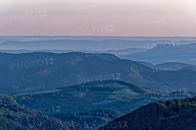 Daybreak over the mountain landscape of the Balkan Mountains and the forested slopes of the Balgarka nature park Park in Central Bulgaria. Shipka
