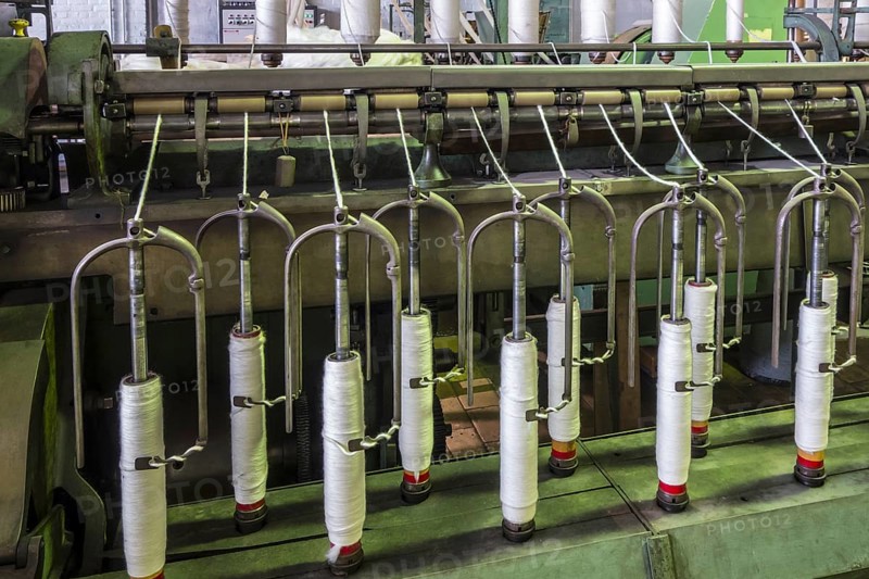 Roving frame machine for drafting the sliver into roving by twisting fibers in cotton mill