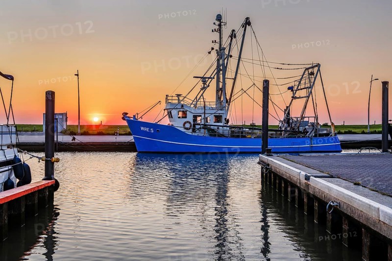 Sielhafen with crab cutter at sunset
