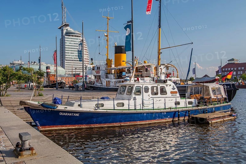 Historic ships in the New Harbour with the Atlantic Sail City Hotel