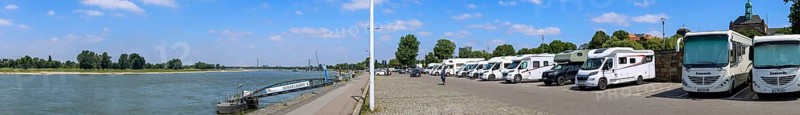 Panoramic photo of motorhome pitches on the banks of the Rhine