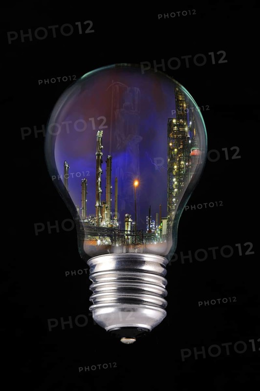 Lightning during thunderstorm above petrochemical industry inside incandescent lamp
