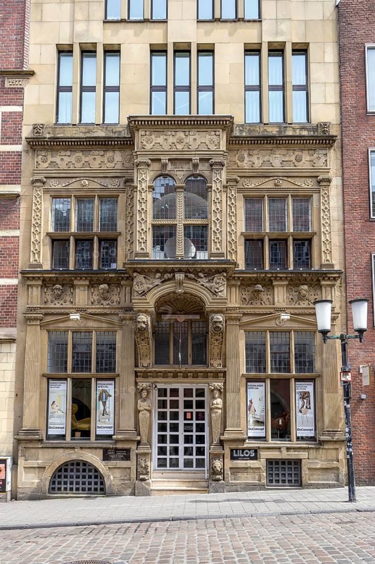 Beautiful facade with entrance portal in neo-baroque style in the street Drubbel
