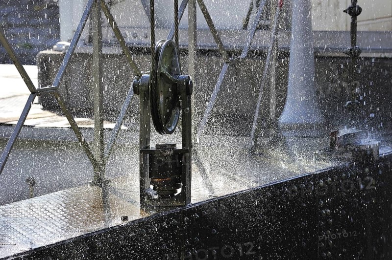 Water pouring down from caisson of hydraulic boat lift on the old Canal du Centre at Houdeng-Goegnies near La Louviere in the Sillon industriel of Wallonia