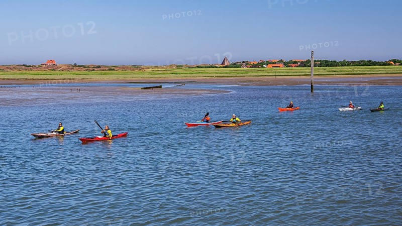 Kayakers in front of the island