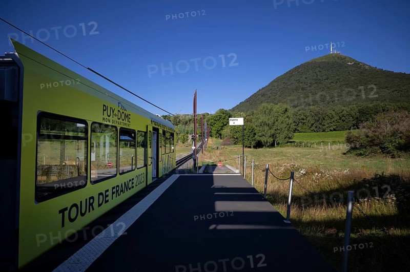 Bottom station of the Panoramique des Domes rack railway in Tour de France 2023 all-car advertising driving up Puy de Dome