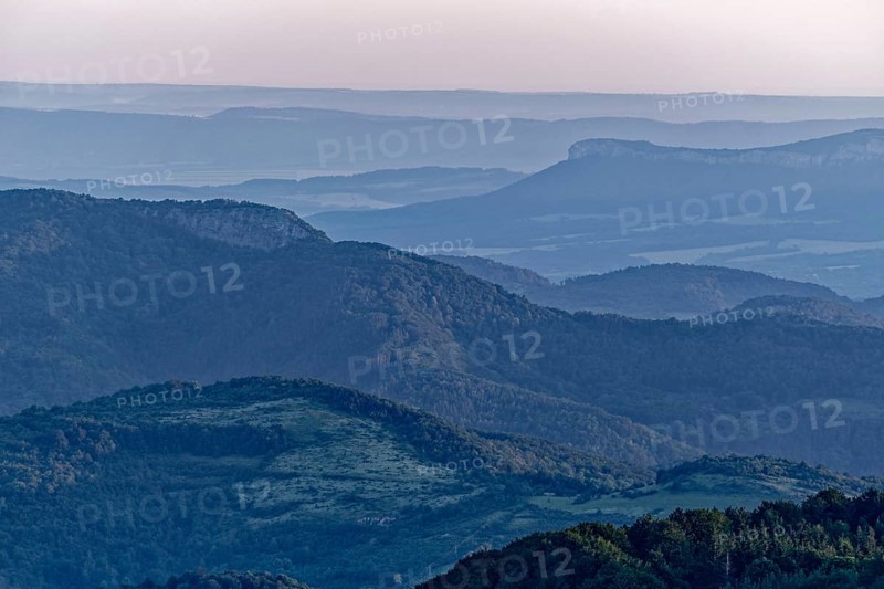 Daybreak over the mountain landscape of the Balkan Mountains and the forested slopes of the Balgarka nature park Park in Central Bulgaria. Shipka