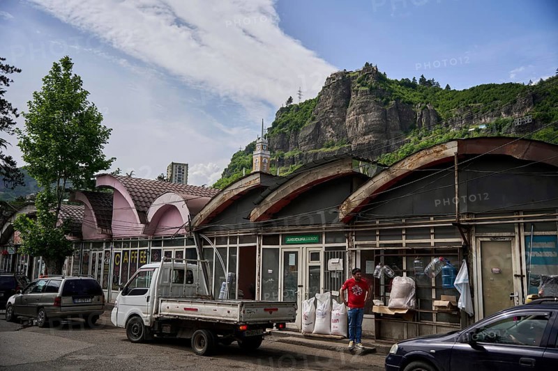 Small shops by the river Qwirila