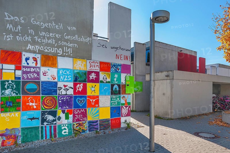 Olympic Village with painting on the former bungalows of the student village