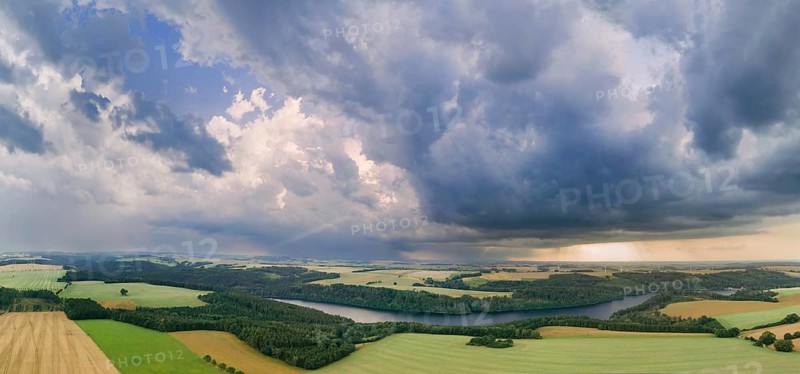 Thunderclouds over the Klingenberg dam in the Ore Mountains. There are plans to build a new wind farm on the site.