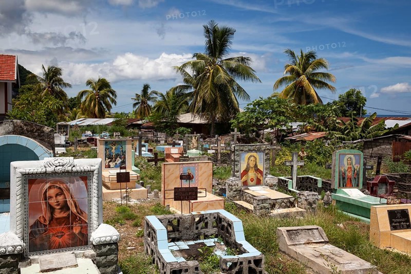 Old Christian cemetery with images of saints