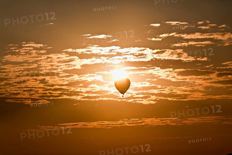 Hot air balloons in the cloudy sky