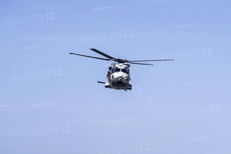 NH90-NFH Caiman NATO Frigate Helicopter of the Belgian Army Air Component in flight during coastal search and rescue mission