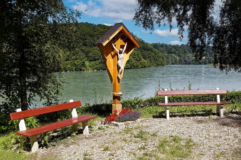 Wooden cross with Christ and roof