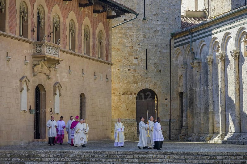 Priest on his way to Mass in the Cathedral di San Cerbone