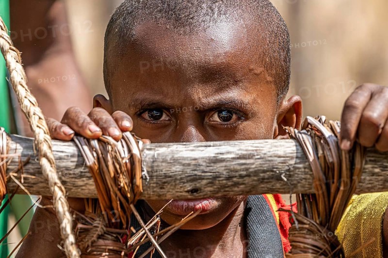 Child in the highlands at a Sing-Sing of the Melpa tribe