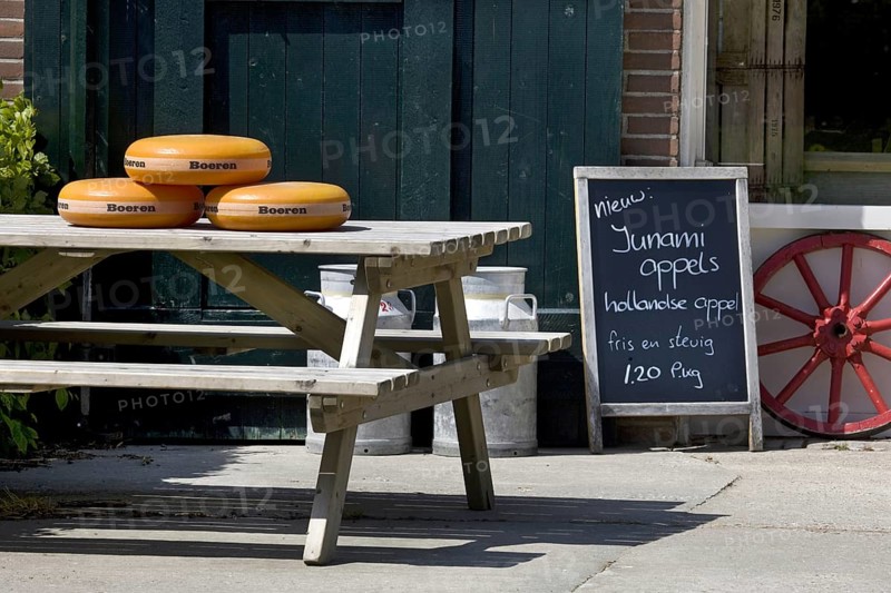 Cheese for sale outside in front of farm in Holland
