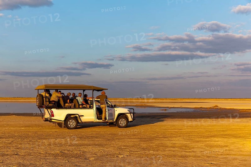 Safari Jeep with tourists at Salt Lake