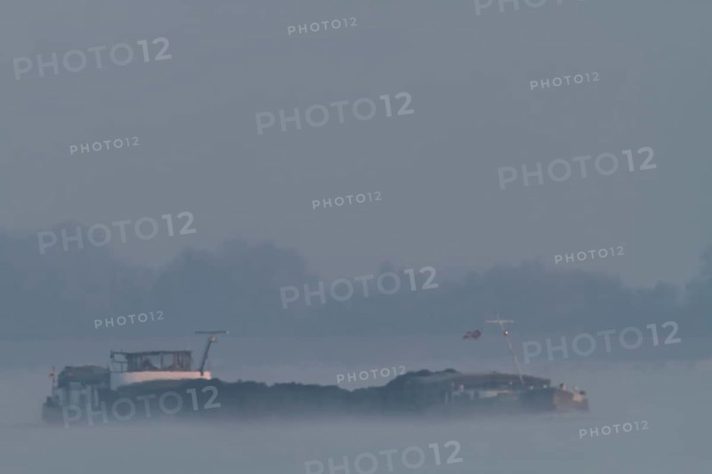 Cargo ship in the fog on the Weser
