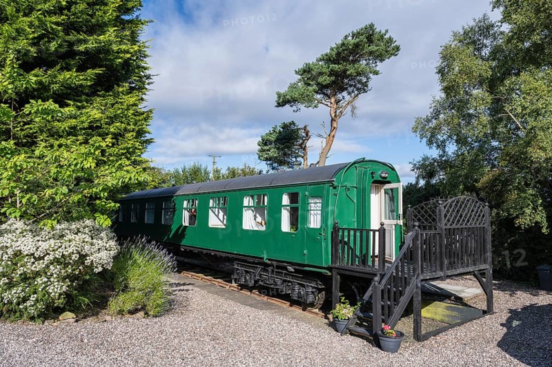Old railway carriage converted into a stationary hostel