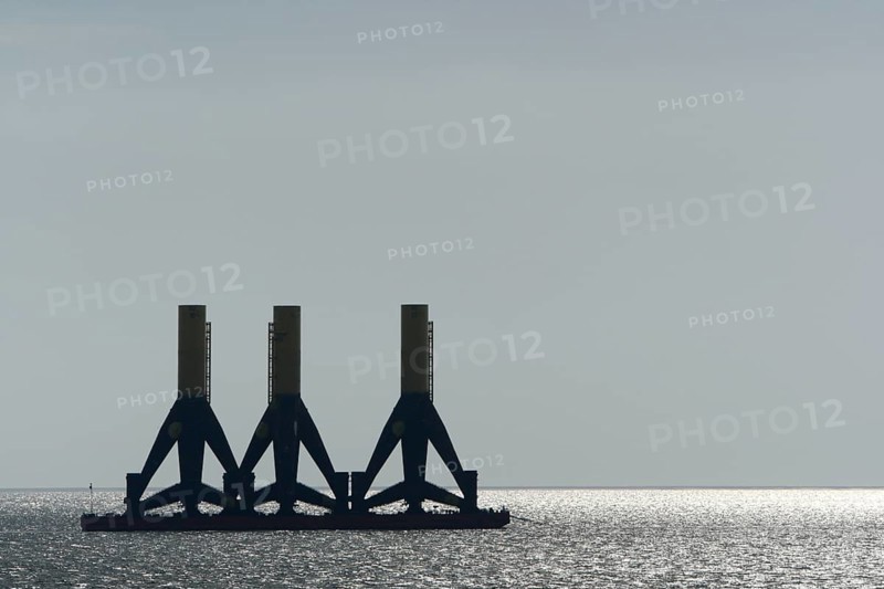 Foundations of offshore wind turbines in tow in the Weser fairway off Minsener Oog