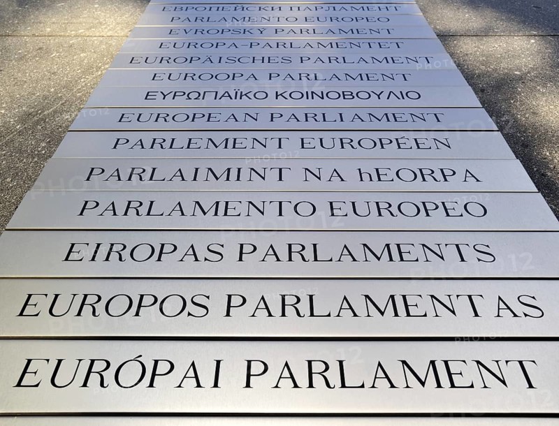 Nameplates of the European Parliament written in different European languages in the Leopold Quarter
