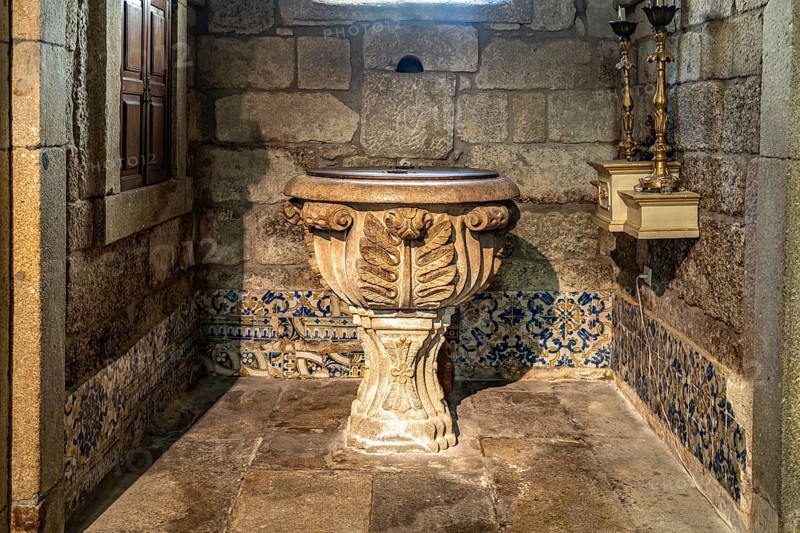 Baptismal font in the church Igreja de Nossa Senhora da Oliveira