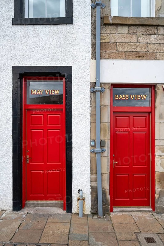 Two red front doors in the fishing village of Pittenweem