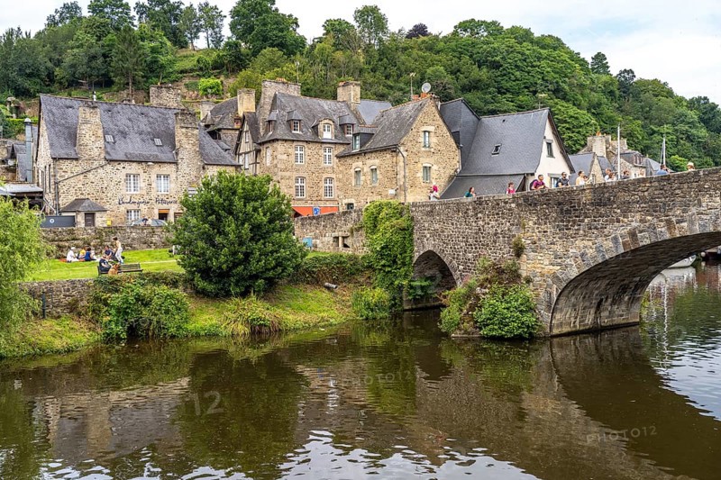 Medieval buildings and stone bridge on the river Rance in Dinan