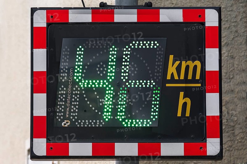 Speed indicator on a road