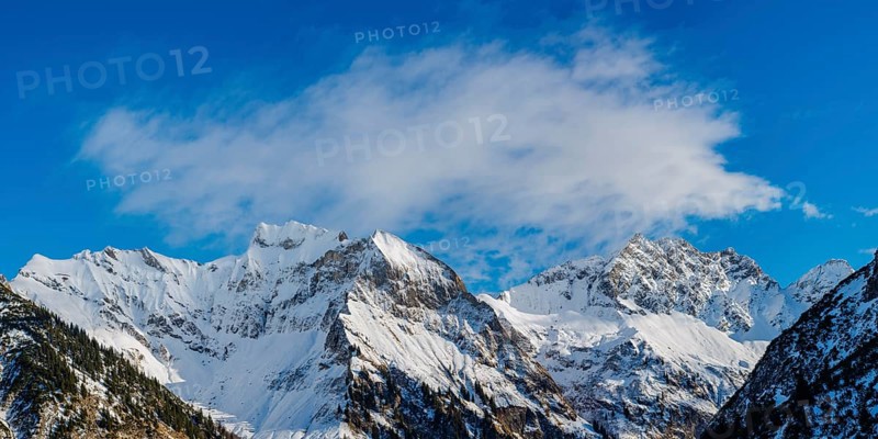 Mountain panorama in winter from Untere Lugenalpe