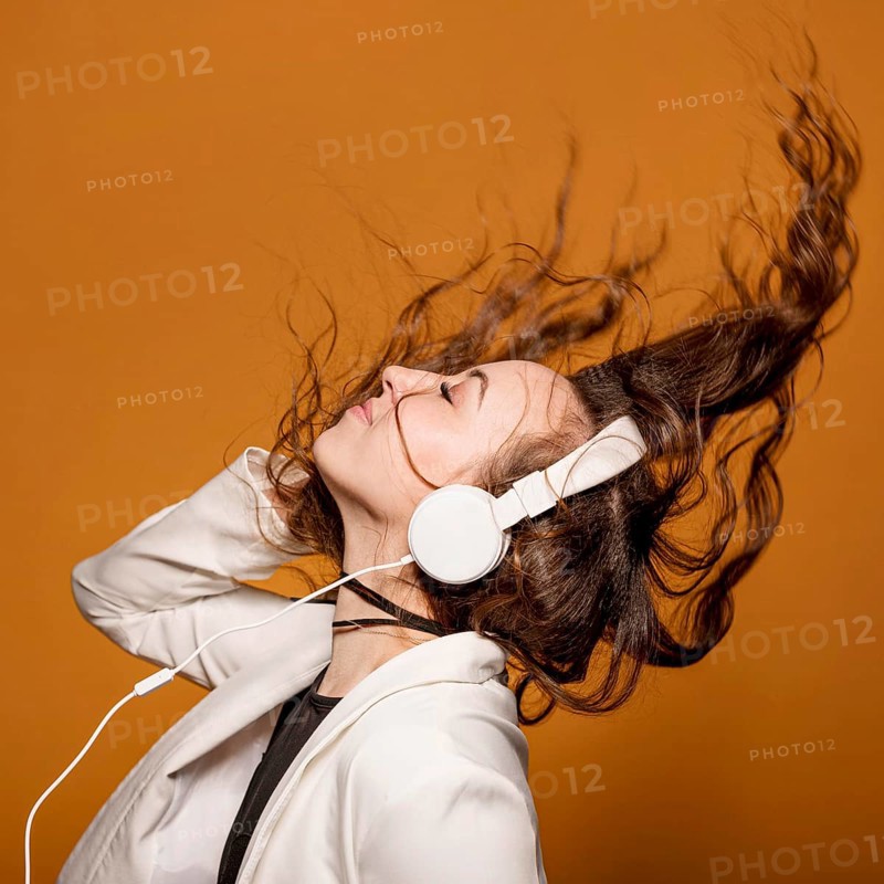Side view female with headphones