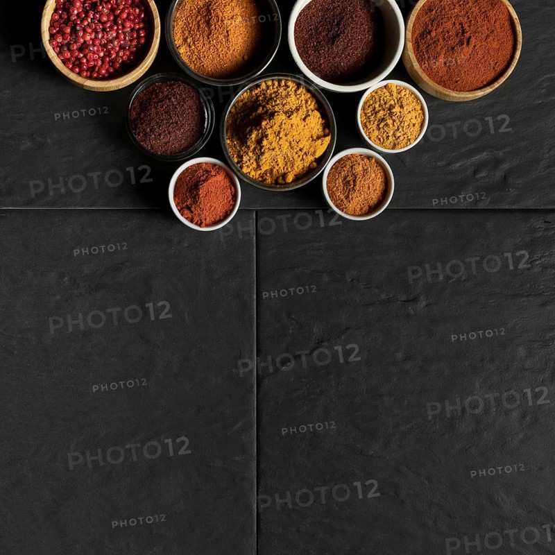 Bowls with condiments copy space