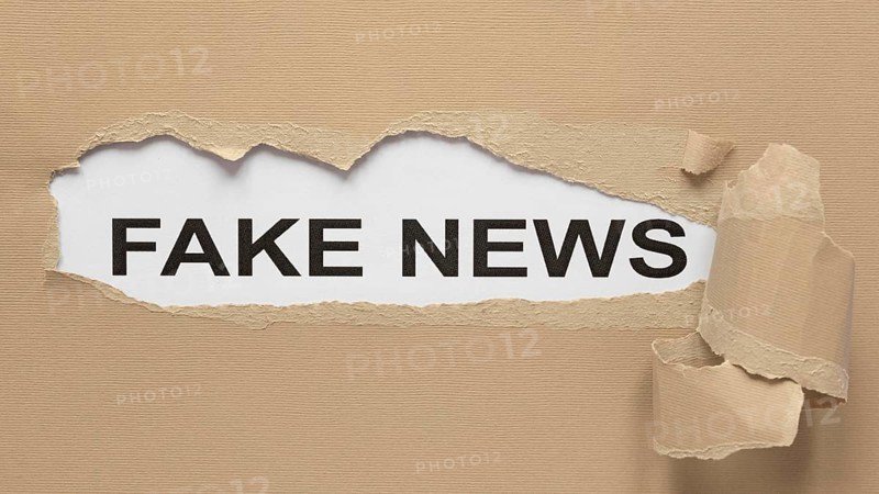 Scratched cartoon with fake news message