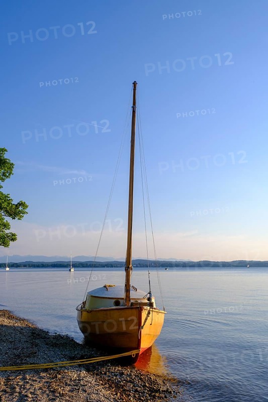 Small sailboat on the shore